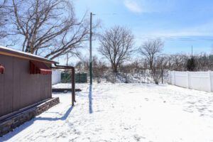 Large fenced backyard — nearly half acre lot at 10145 Hansen Ave, Rockbrook, Omaha NE